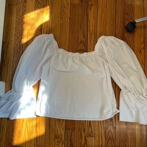 Off the shoulder noise with dramatic bell sleeve detail